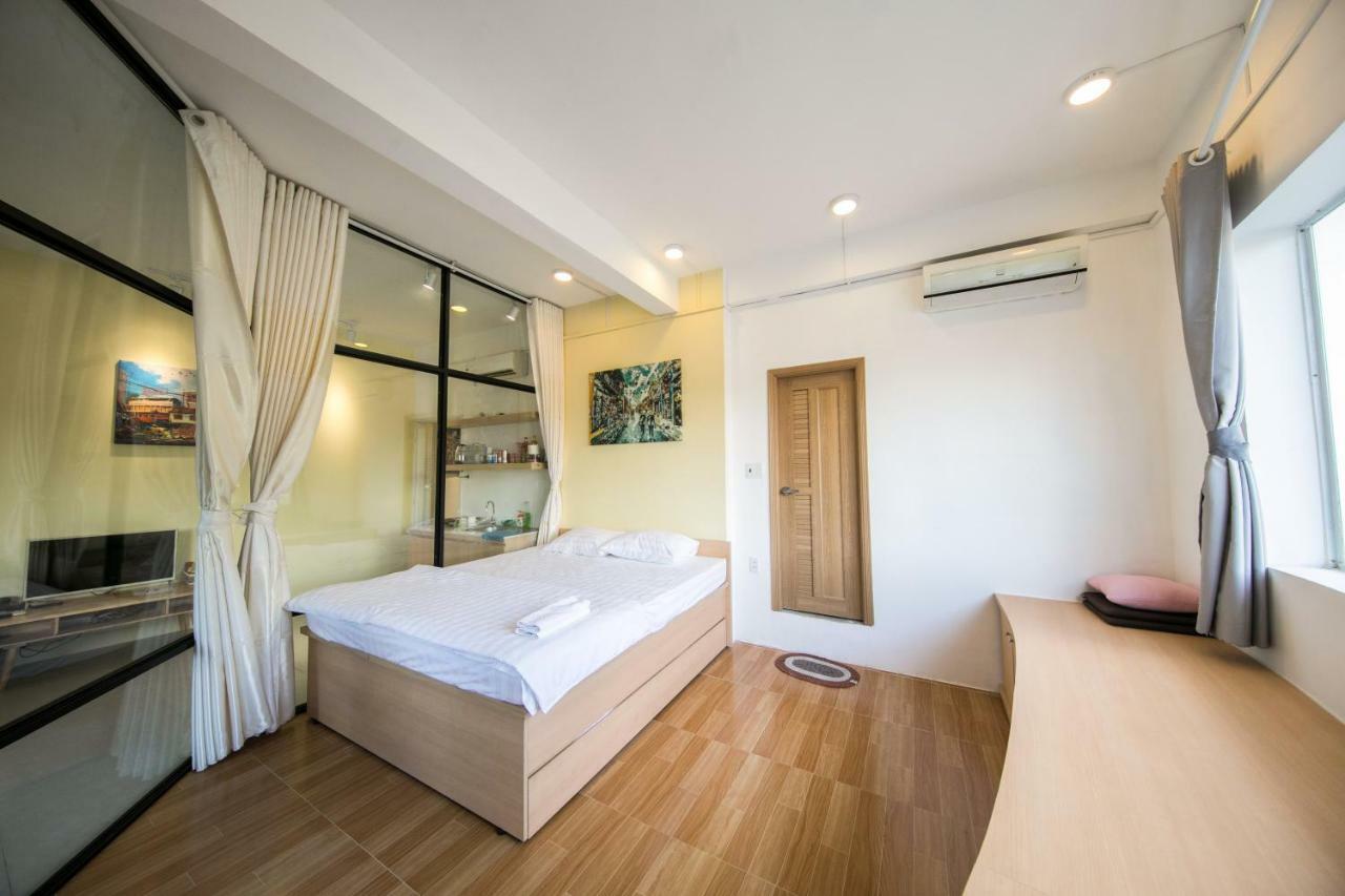 The Wooden Apartments - In The Heart Of Ben Thanh Cidade de Ho Chi Minh Quarto foto